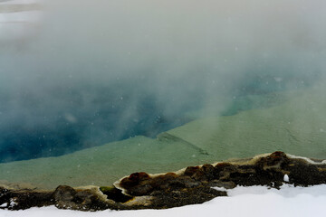 Winter Snowing Geothermal Pool Yellowstone