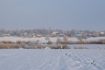 winter village across the river