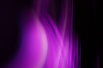 Abstraction of lines of colored blurred light.