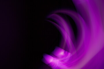 Abstraction of lines of colored blurred light.