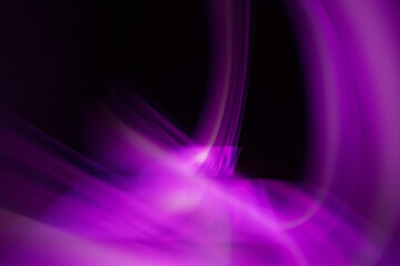Abstraction of lines of colored blurred light.