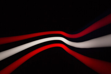 Abstraction of lines of colored blurred light.