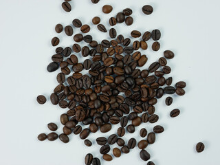 roasted coffee beans isolated on a white background