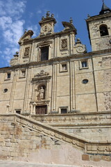 Fototapeta na wymiar Stone facade of the Church of San Nicolás el Real, in Villafranca del Bierzo, León, Spain. Vertical image.