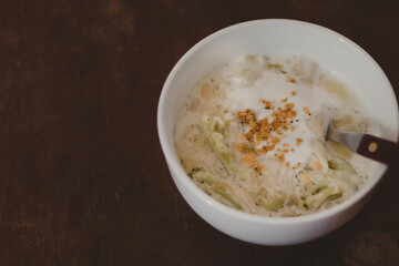 bowl of creamy cheese pasta with vegetables