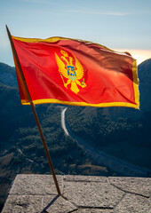 National flag of Montenegro,on the summit of Mount Lovcen,Montenegro,Eastern Europe.
