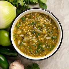 Green hot sauce with jalapeno pepper. Mexican food