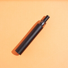 electronic cigarette on an orange background