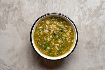 Green hot sauce with jalapeno pepper. Mexican food