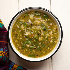 Green hot sauce with jalapeno pepper. Mexican food