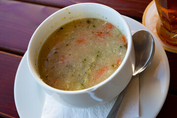 Soup - broth with semolina and egg. High quality photo