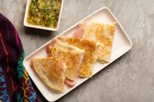 Ham and cheese quesadilla with flour tortilla. Mexican food