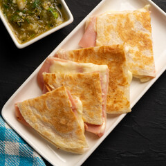 Ham and cheese quesadilla with flour tortilla. Mexican food
