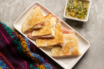 Ham and cheese quesadilla with flour tortilla. Mexican food