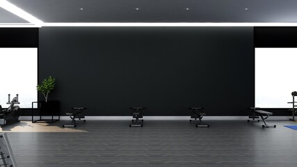 Black blank wall in modern gym interior with wooden floor