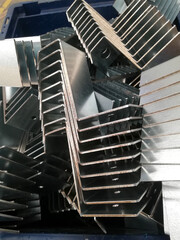 Pile of parts of a sheet metal bending metallurgical industry