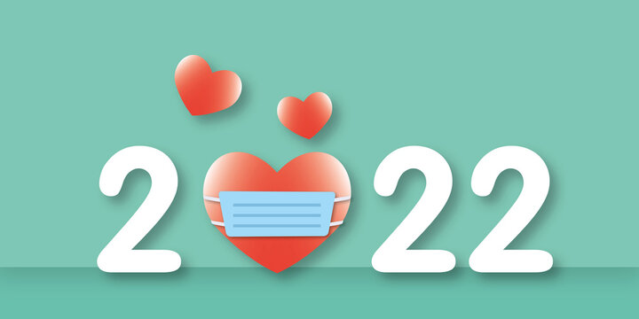 Red heart wearing mask with year 2022 on green background. Greeting card for Valentine, Wedding, Mother's, Father's day, birthday, poster or postcard, love concept. copy space. paper art design style.