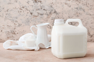 Gallon bottle of milk on table