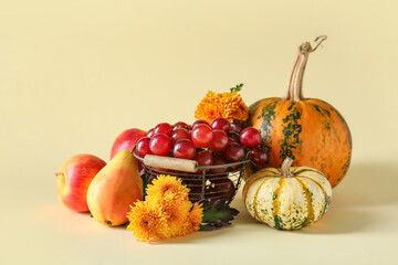 Different healthy food on beige background. Harvest festival