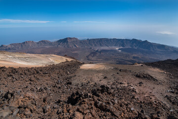 Fototapeta na wymiar Panoramic view of Mount Teide largest crater from the peak of it's volcano - Santa Cruz de Tenerife, Canary Islands, Spain