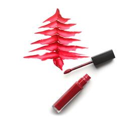 Christmas tree drawn with liquid lipstick on white background