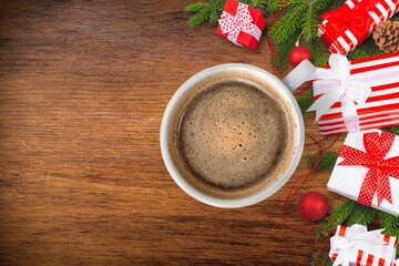 Welcome 2021 theme coffee cup on wooden table with dried pine branches. Happy new year 2021,...