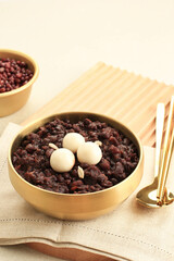 Patjuk or Red Bean Porridge Topped with Round Rice Cake, Eat at Winter Solstice Festival, Copy Space for Text