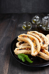 Pastry puff filling with bananas, cheese and chocolate shaped with banana molded or banana milk pastry. 
