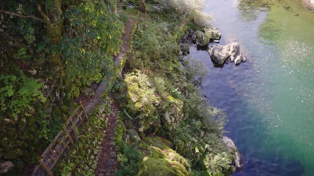 Yoshida River Running Through Gujo Hachiman on Warm Golden Summer Day in Japan