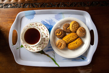 cup of coffee and cookies