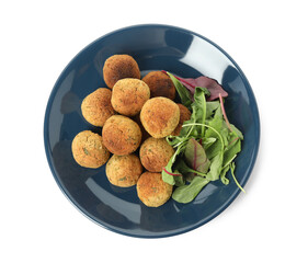 Delicious falafel balls with herbs on white background, top view