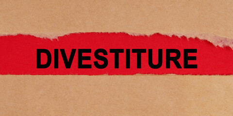 Among the torn sheets of paper on a red background, the inscription - DIVESTITURE