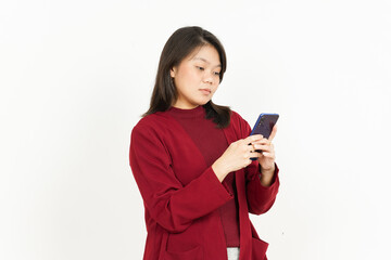 Holding and Using Smartphone Of Beautiful Asian Woman Wearing Red Shirt Isolated On White Background
