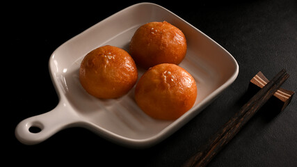 Homemade Chinese fried buns on a plate