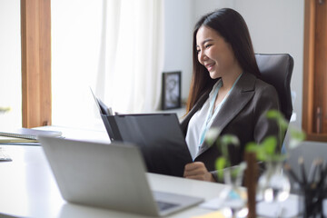 Female manager reading the informations on a document