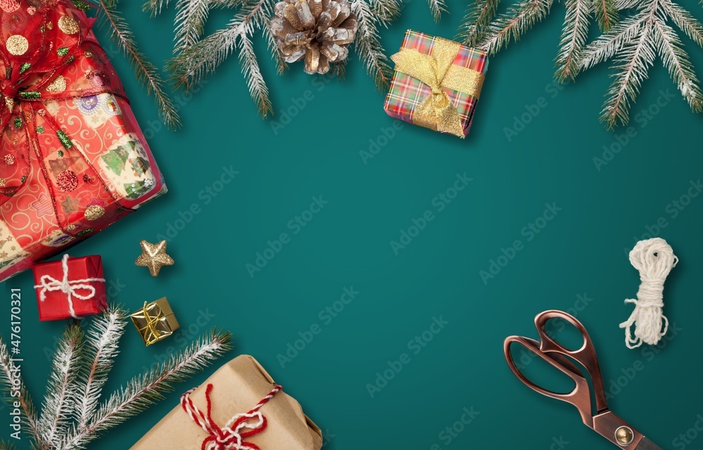 Poster Christmas frame with gift boxes, paper decorations, jingle bells and spruce branches