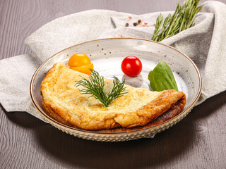 Dietary omelet served ripe tomato