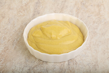 Organic mustard sauce in the bowl