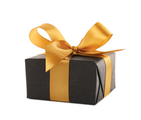 Black gift box with golden bow on white background