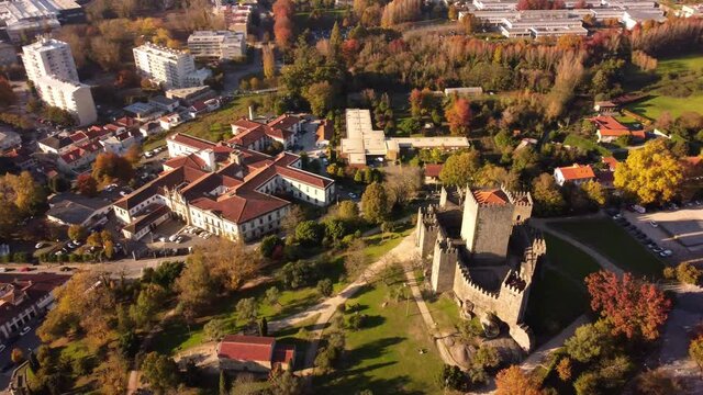 Aerial panoramic view of guimares old town in Portugal with city center and stone medieval castle fortress