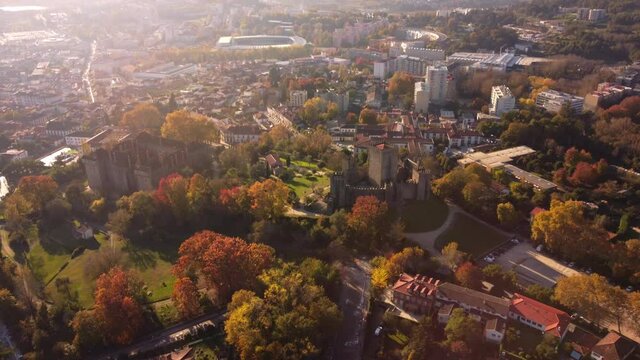 Aerial view of sunset in guimares city of Portugal with center old town and medieval stone castle fortress