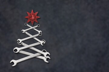 Christmas tree made from steel tools. A happy new year and merry Christmas holiday.