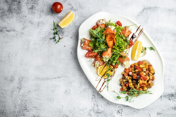 Asian menu. Set of Japanese seafood snacks fresh salmon rolls with cheese and vegetables. banner, menu, recipe place for text, top view