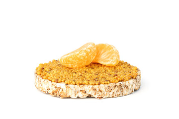 dietary buckwheat bread with mustard grains and tangerine pieces isolated on white
