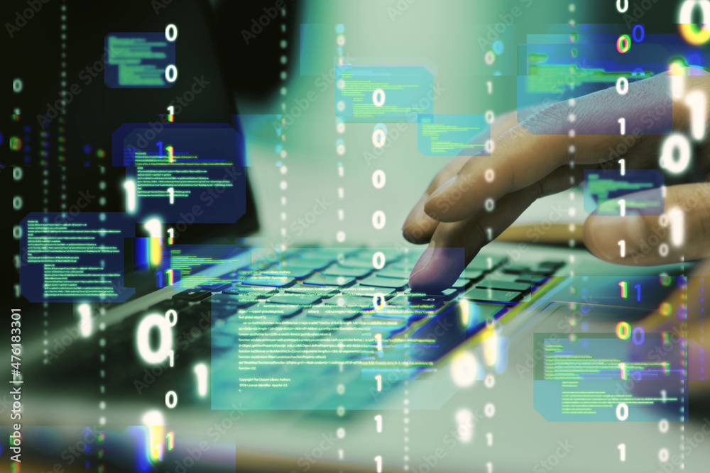 Leinwandbilder Close up of hands using laptop keyboard with abstract coding binary code hologram on blurry background. Artificial intelligence and development concept. Double exposure.