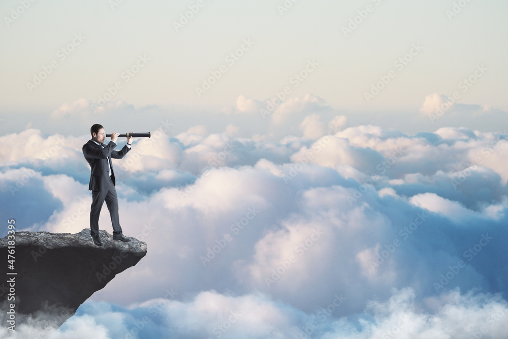 Aufkleber Abstract image of businessman with telescope looking into the distance while standing on edge of cliff, mock up place on sky with clouds background. Success, challenge, future and growth concept.