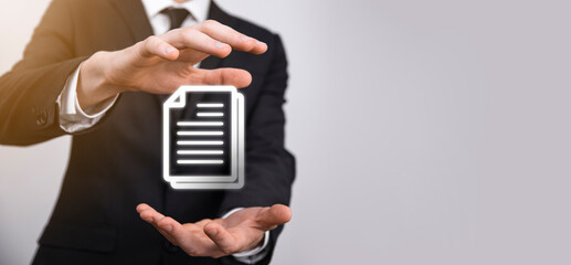 Businessman man holding a document icon in his hand Document Management Data System Business Internet Technology Concept. Corporate data management system DMS
