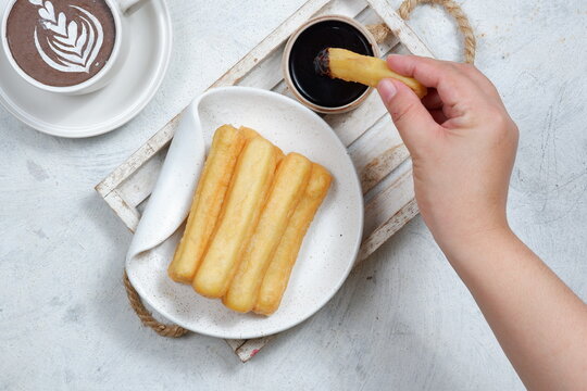 Churros,spanish traditional dessert and chocolate dipping