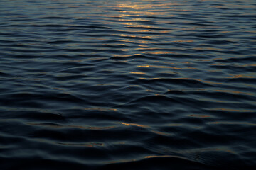 Close up water surface of the wave with soft sunlight.