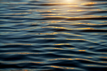 Close up water surface of the wave with soft sunlight.